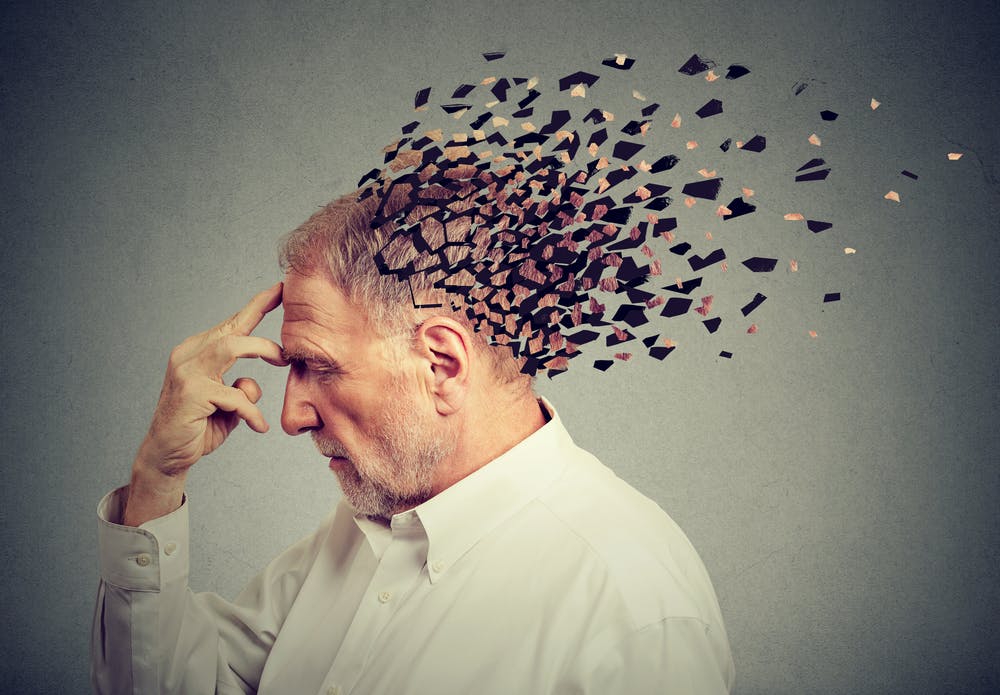 An image of a man with a scattered memory to represent experiencing Alzheimer's