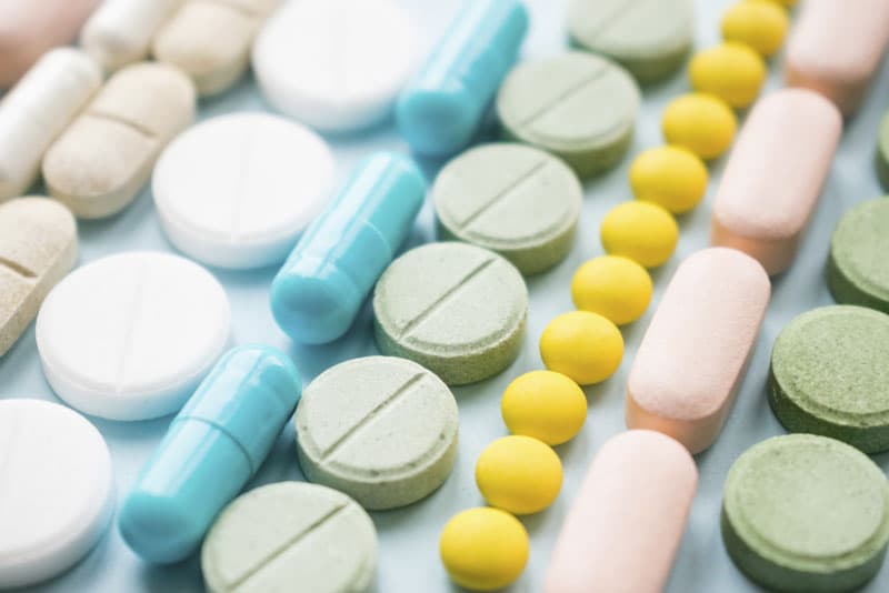 Various painkiller tablets next to each other