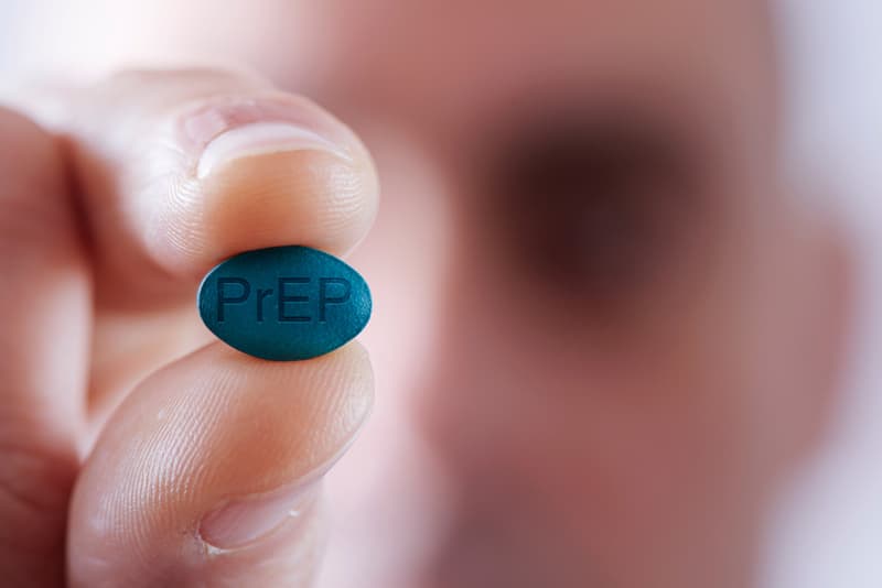 A PrEP tablet in a mans hand