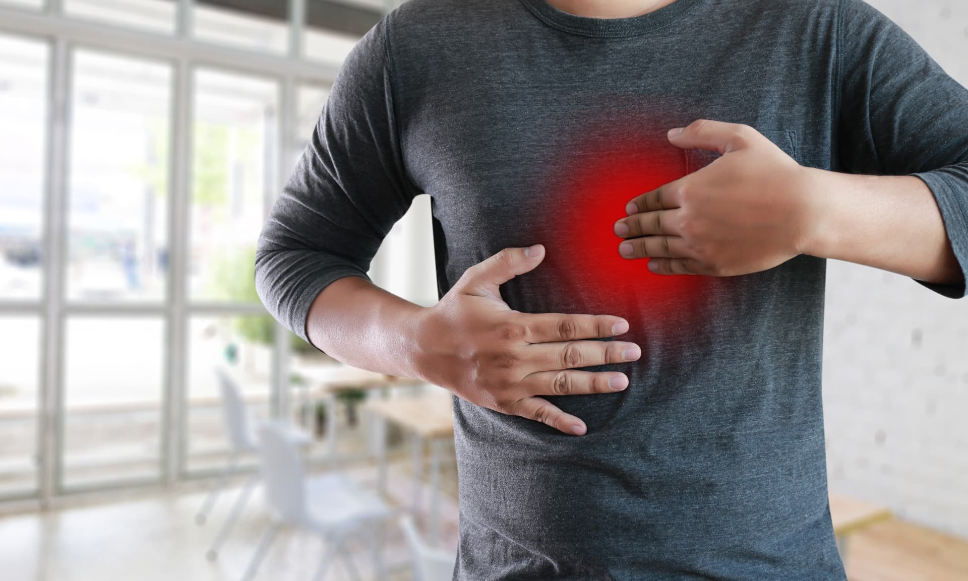 A man experiencing acid reflux