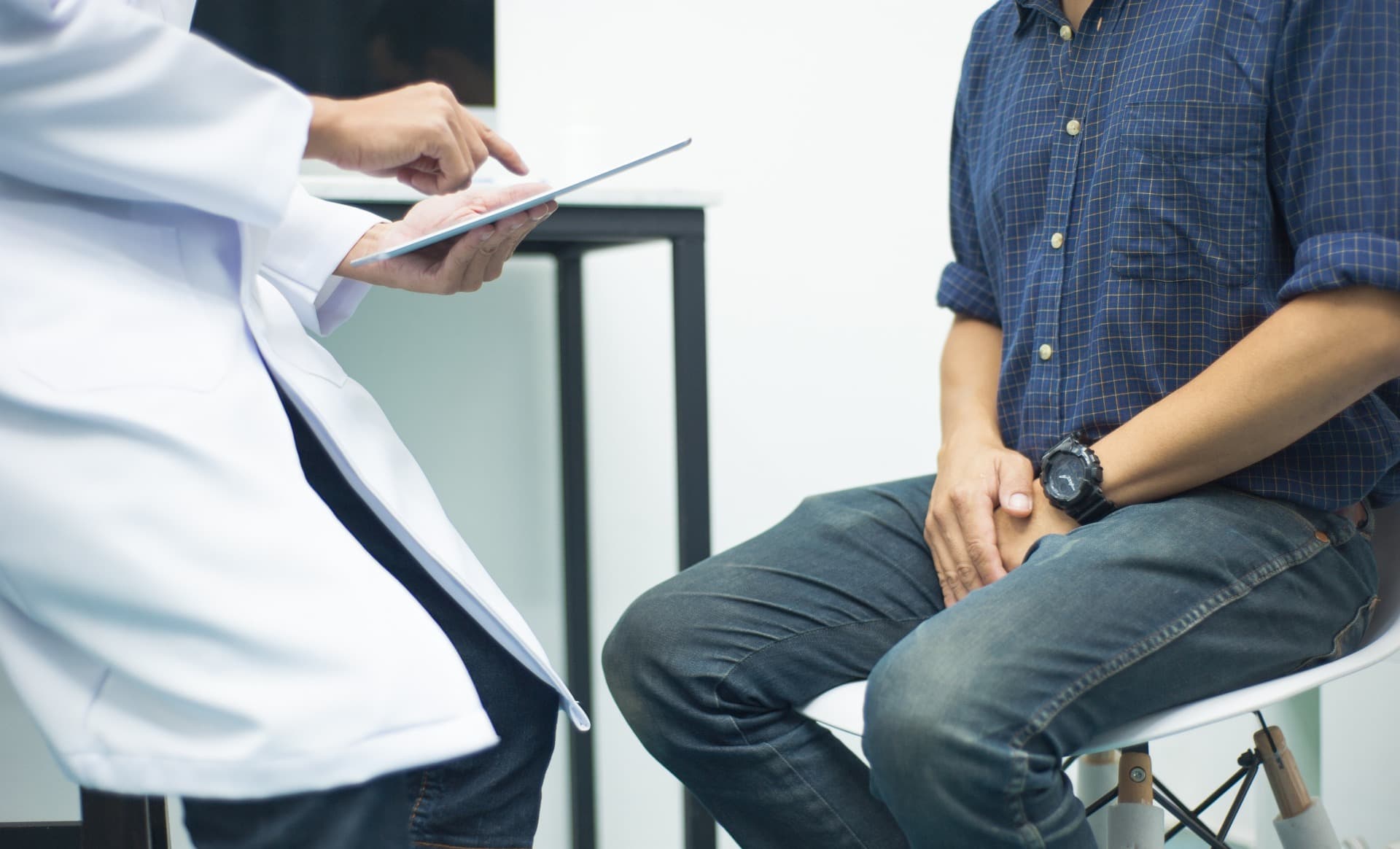 A patient consulting with their doctor