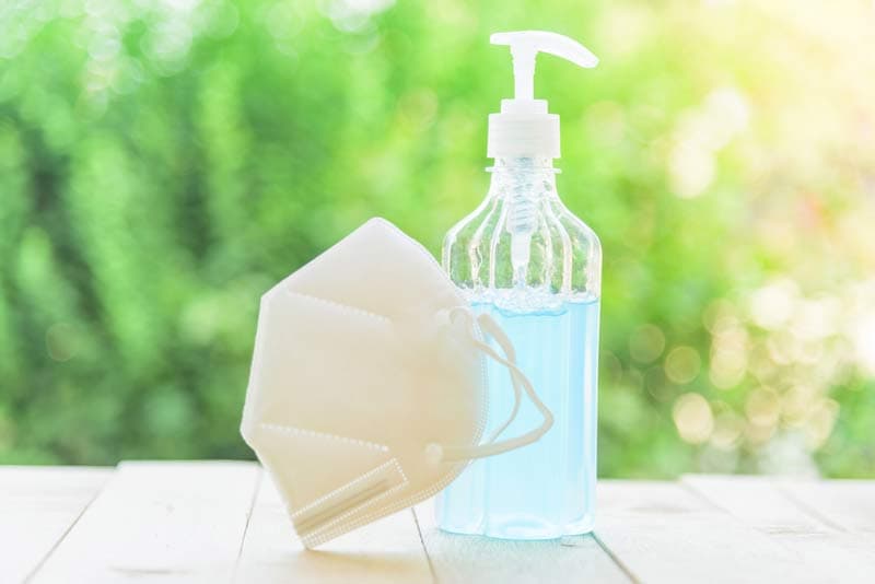 An N95 mask and hand sanitiser