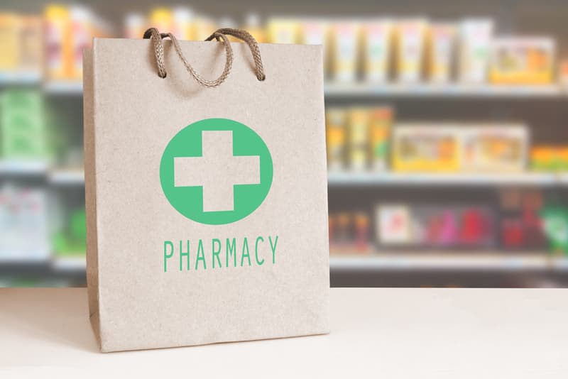 A carrier bag with the word pharmacy on it