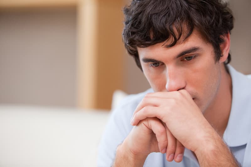 A man looking depressed